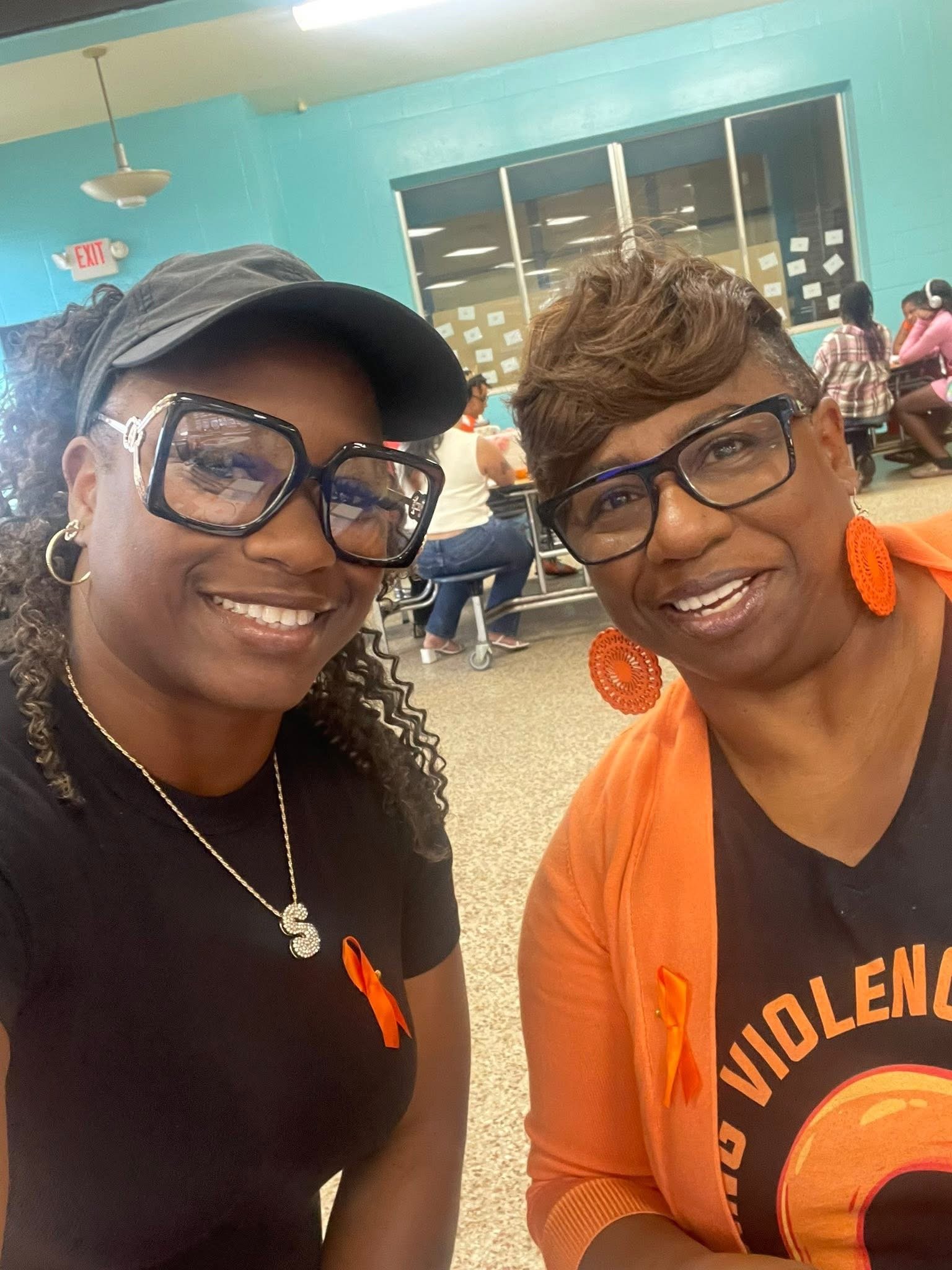 Community Hands of Hope team members at domestic violence awareness event